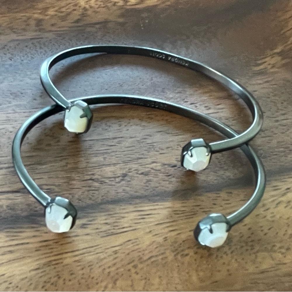 2 EUC Kendra Scott Ivory MOP/Gunmetal Teddy Cuff bracelets